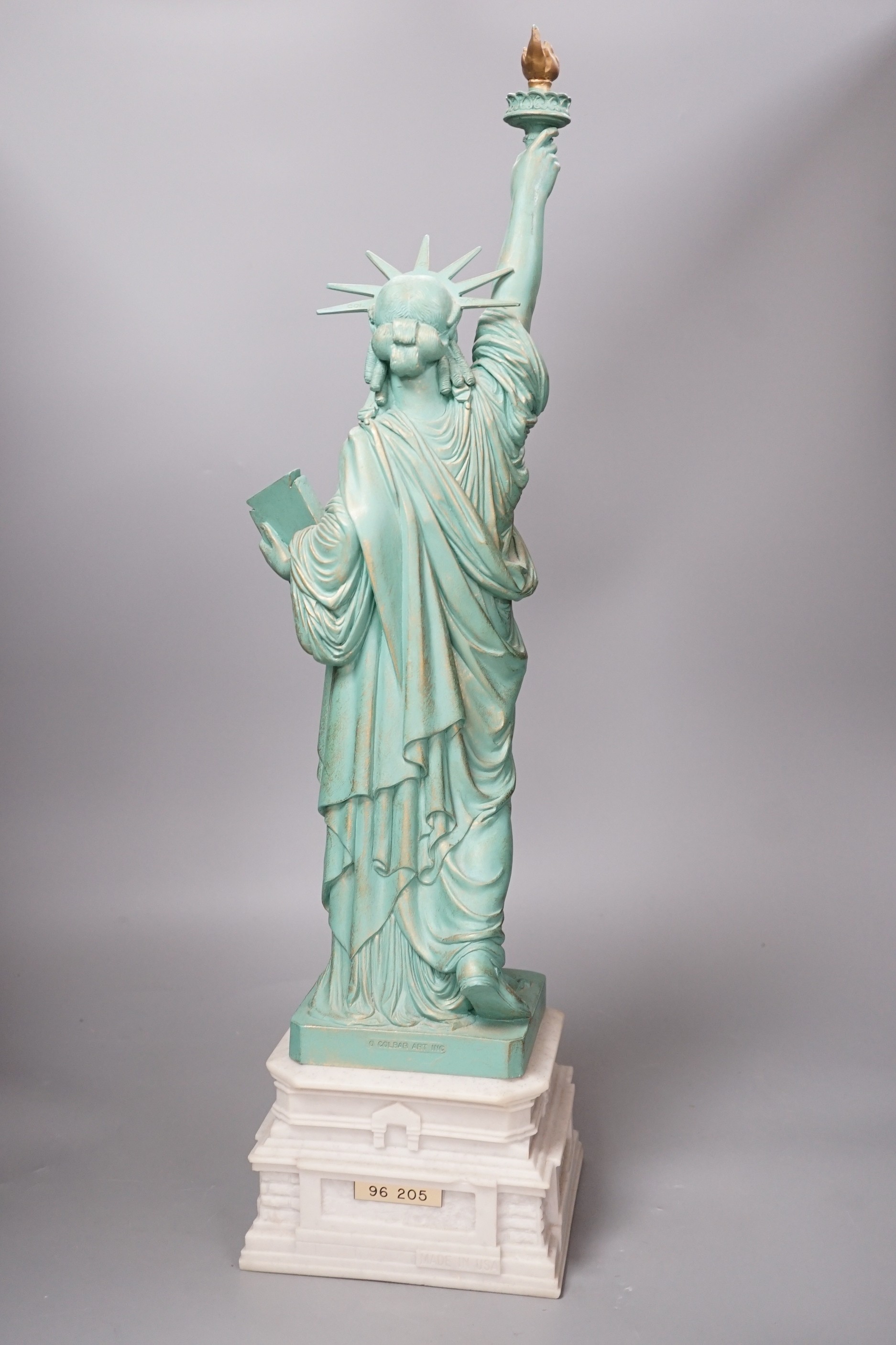 A Colbar Art Inc. bronzed resin model of the Statue of Liberty. 60cm high